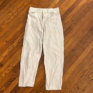 Mid rise baggy white pants that taper a little at the ankle